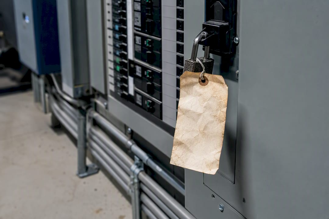 Maintenance tag on electrical panel in utility room